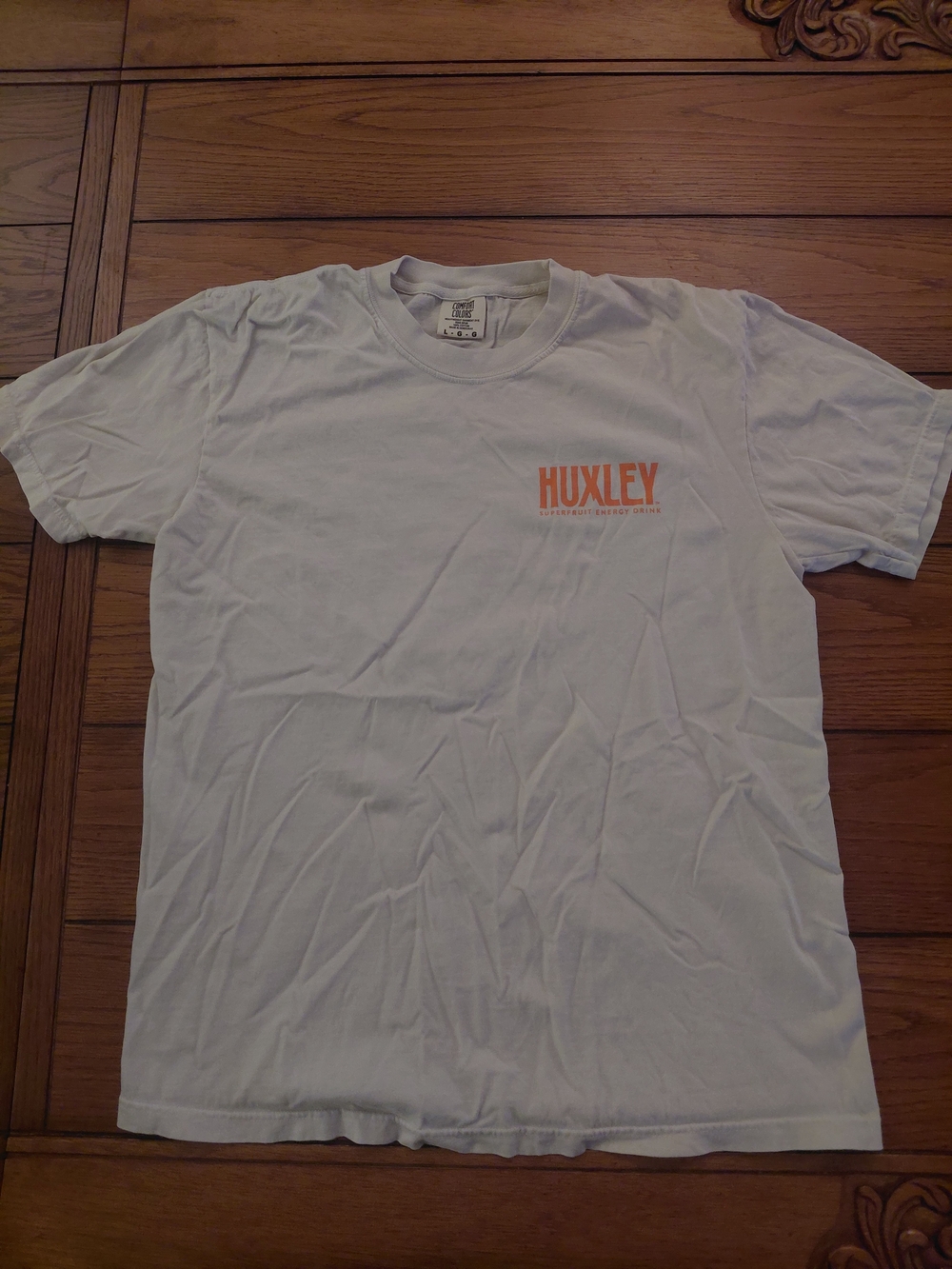 Comfort Colors White Short Sleeve Tee with Orange Huxley Logo